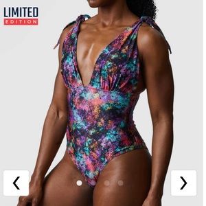 Born Primitive Oasis one piece swimsuit. Size S. NWT
